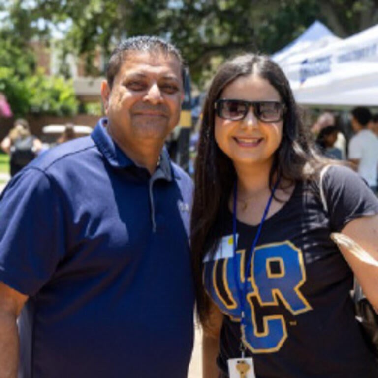 Parent with student smiling