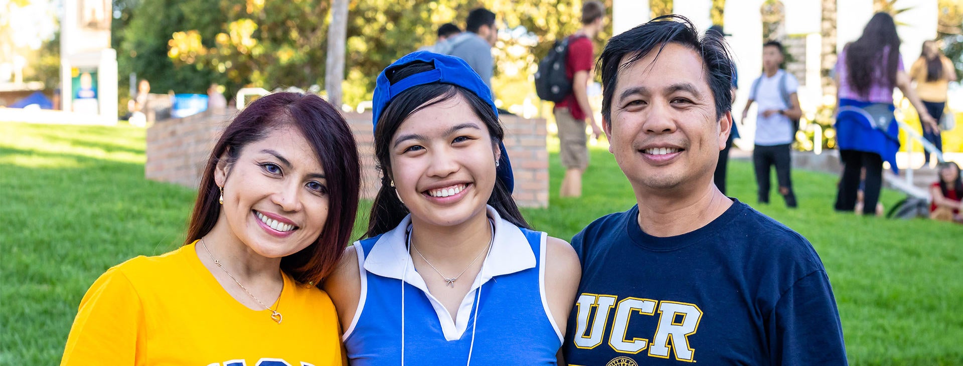 An incoming UCR student is joined by their family members at Highlander Orientation.